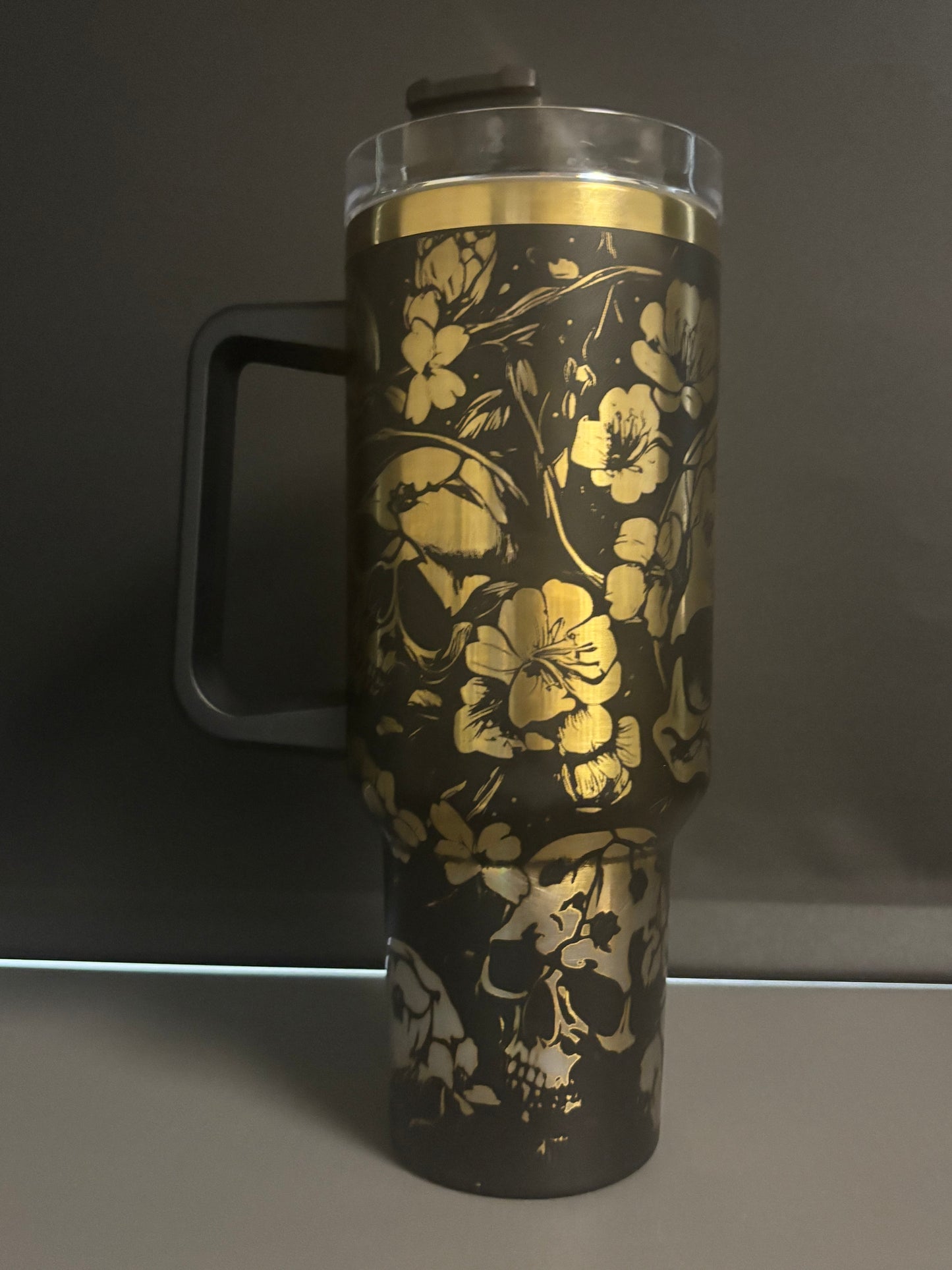 Skulls & Flowers 40oz black/gold laser engraved Tumble