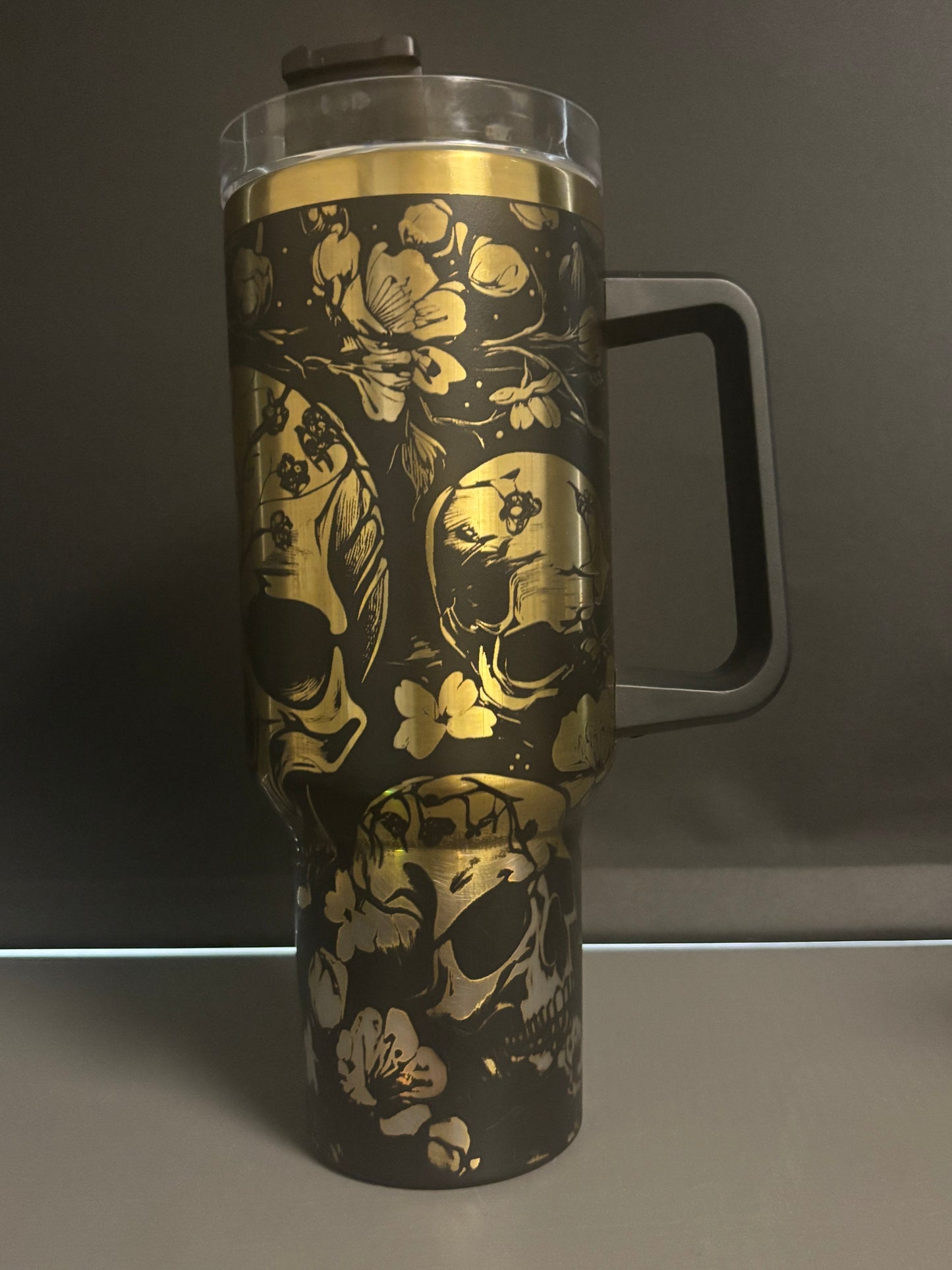 Skulls & Flowers 40oz black/gold laser engraved Tumble