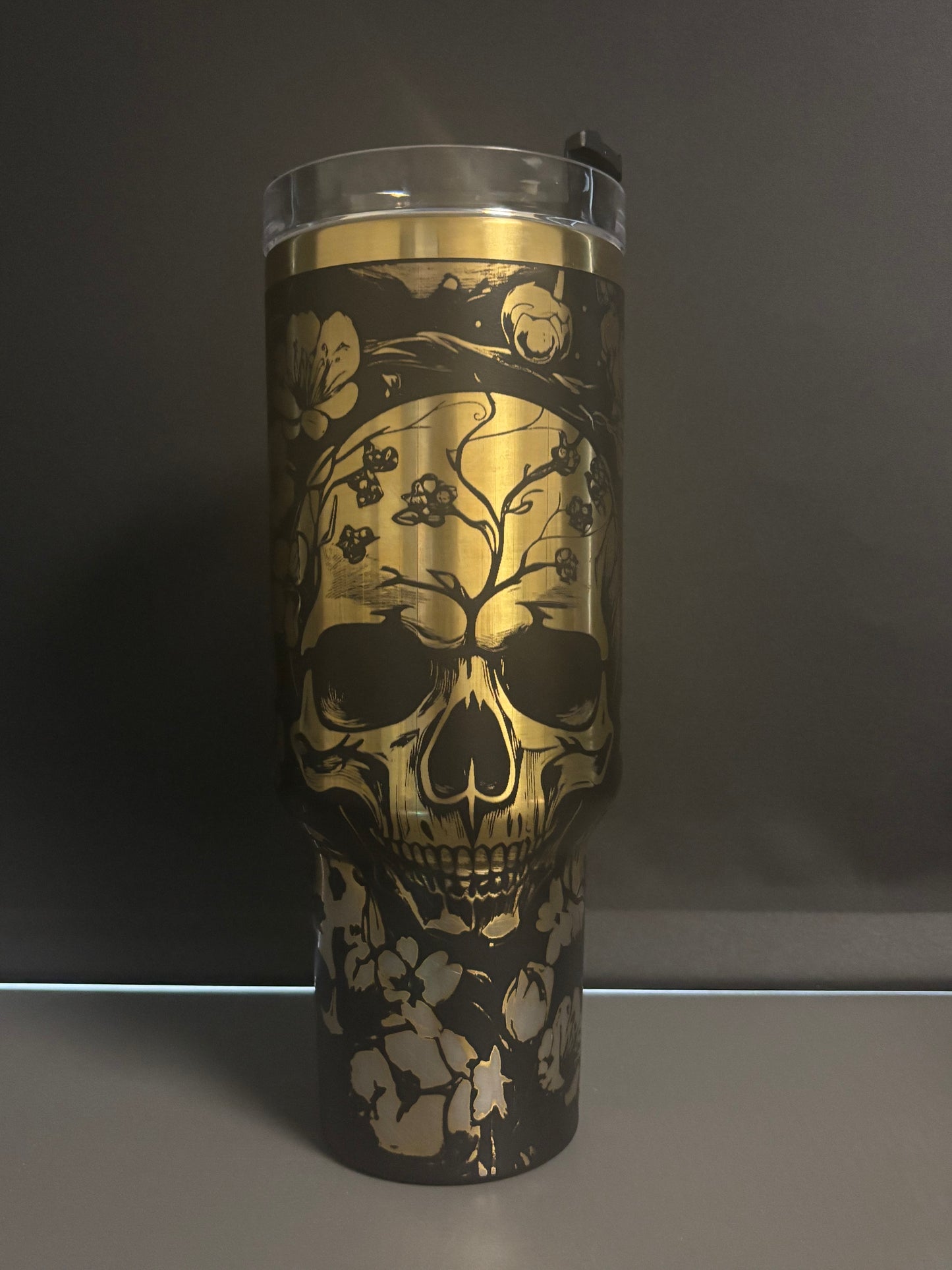 Skulls & Flowers 40oz black/gold laser engraved Tumble